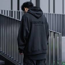 The Black Essentials Hoodie A Staple of Streetwear Fashion